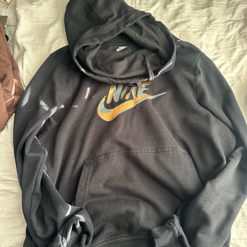 Nike women’s  Black Hoodie with Gold Logo